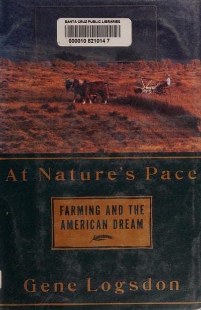 A hardcover jacket split horizontally: the top half a sepia-toned photo of a horse-drawn plow team crossing a golden field, the bottom half dark green with the title in large gold serif type, the subtitle boxed in tan below it, and the author's name in gold at the foot; a 'Santa Cruz Public Libraries' barcode sticker is affixed near the top.