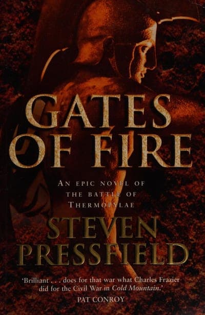 A dark bronze-red field with a sculptural, statue-like image of two ancient Greek warriors' heads and shoulders, the title 'GATES OF FIRE' in large gold serif capitals, the line 'An epic novel of the Battle of Thermopylae' beneath it in small gold capitals, the author's name 'STEVEN PRESSFIELD' in gold serif below that, and a Pat Conroy blurb comparing the book to Cold Mountain near the foot.