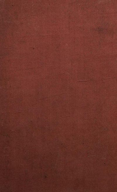 A plain, worn maroon-red cloth hardback binding with no visible title, author, illustration, or publisher's device — only the woven cloth texture with scuffs and crease marks.
