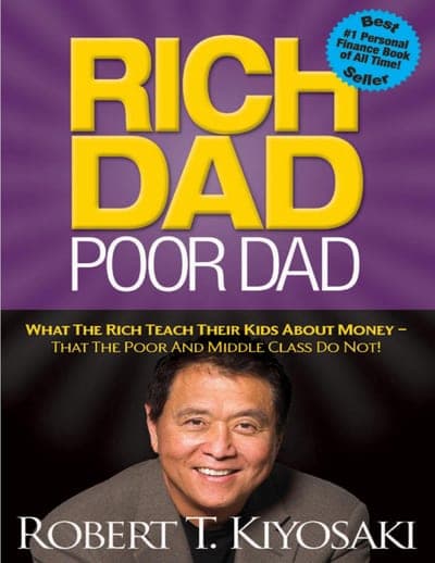 A purple field with a radiant sunburst pattern, the title 'RICH DAD POOR DAD' in huge yellow block caps, a blue starburst badge reading 'Best #1 Personal Finance Book of All Time! Seller', the subtitle in yellow beneath the title, a photo of a smiling Robert Kiyosaki in a grey suit across the bottom, and his name in a white band above the photo.