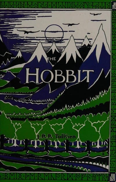 A cream field bordered on all sides by a running band of black runic lettering; a green, blue and black line-drawn landscape fills the cover, showing snow-capped mountain peaks with a blue sun/moon disc above them, three black birds in flight, dark green pine forest below, and a winding blue river; "THE" sits in small white capitals above "HOBBIT" in large white serif capitals, and the author's name sits below in white.
