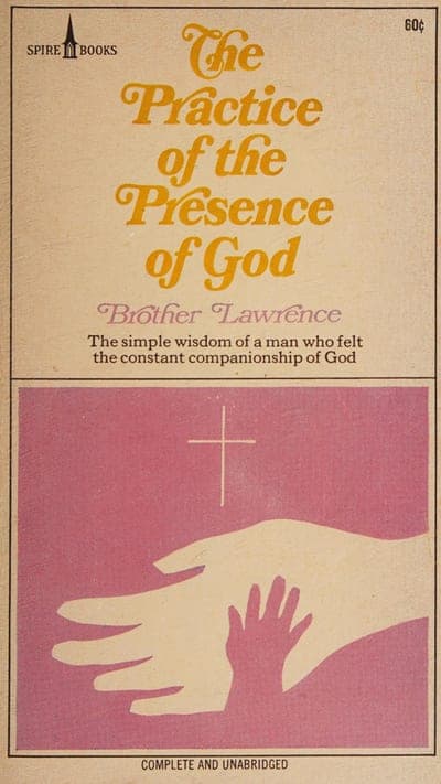 A cream field with a small steeple 'SPIRE BOOKS' logo and '60¢' price at the top corners, the title lettered in orange script, 'Brother Lawrence' in purple script beneath it, the tagline 'The simple wisdom of a man who felt the constant companionship of God', and a stark two-color (magenta and cream) illustration below a horizontal rule of a large hand reaching down to a small child's hand beneath a plain cross, with 'COMPLETE AND UNABRIDGED' along the bottom.