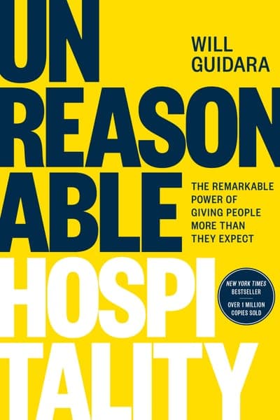 The Optimism Press edition of Unreasonable Hospitality — a bright yellow field with the title in dark navy lettering.