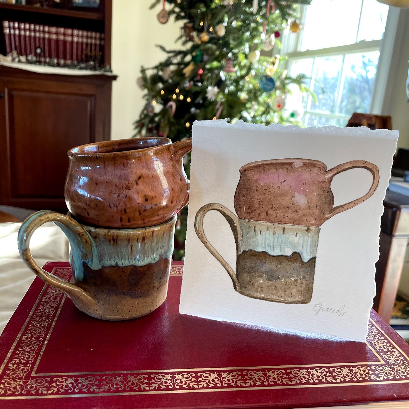 The matching mugs from a local potter